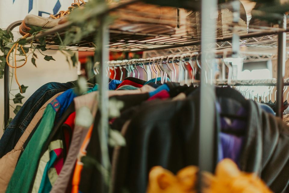 A rack of clothes in a clothing store